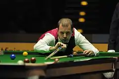 Hawkins holding a rest in his left hand ...