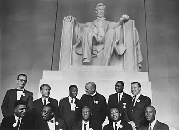 Image 10Leaders of the march in front of the statue of Abraham Lincoln: (sitting L-R) Whitney Young, Cleveland Robinson, A. Philip Randolph, Martin Luther King Jr., and Roy Wilkins; (standing L-R) Mathew Ahmann, Joachim Prinz, John Lewis, Eugene Carson Blake, Floyd McKissick, and Walter Reuther (from March on Washington for Jobs and Freedom)