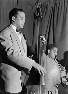 John Kirby (standing) and Buster Bailey (seated), Washington D.C., c. May 1946 Photography by William P. Gottlieb