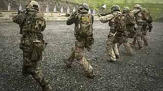 Marines with 15th Marine Expeditionary Unit’s Maritime Raid Force hone their skills on the move during precision marksmanship training at Camp