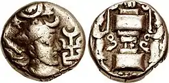 Late Hunnic coin of the Peroz type, with tamgha in front of the ruler.